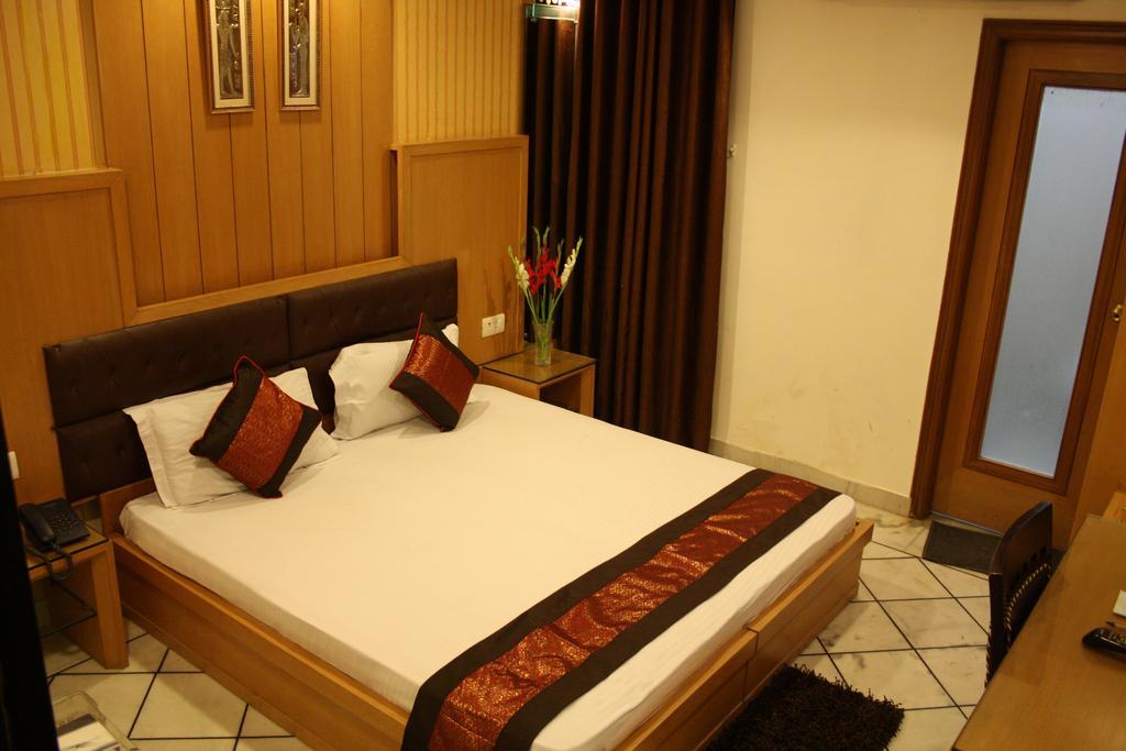 Hotel Apra Inn New Delhi Rum bild