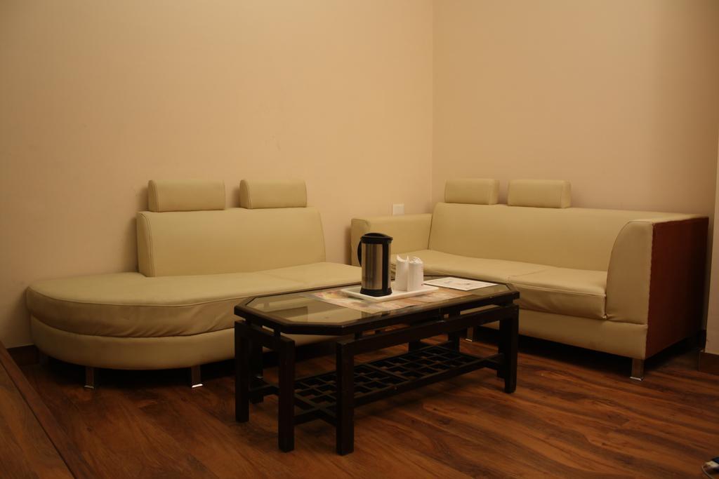 Hotel Apra Inn New Delhi Rum bild